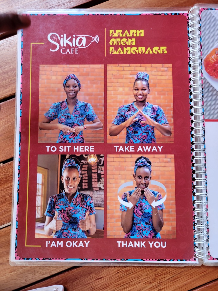 A poster featuring four pictures of a woman making signs in Ugandan Sign Language.